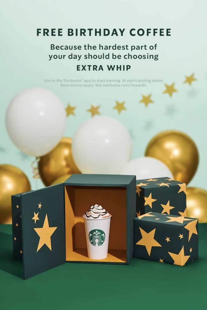open green gift box with starbucks large cup inside